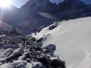 Climbing through snow and rocks